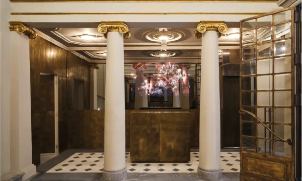 Cloakroom area and classical columns at Teatro Nazionale Firenze Cloakroom entrance at Teatro Nazionale framed by classical columns
