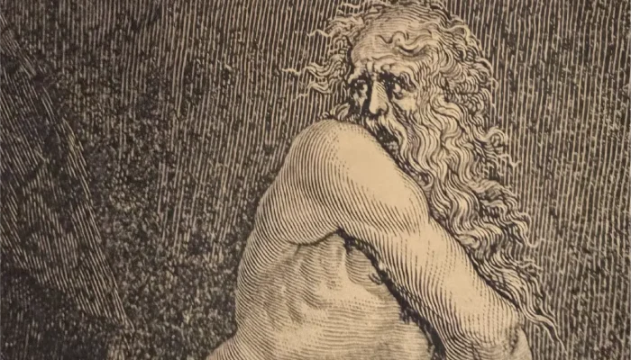 Primo piano di incisione dantesca che raffigura un dannato dell'Inferno sulle pareti del Teatro Nazionale di Firenze